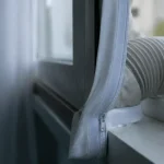 Meilleur kit calfeutrage pour climatiseur mobile : tuyau de climatiseur dans une fenêtre, kit souple à fermeture éclair